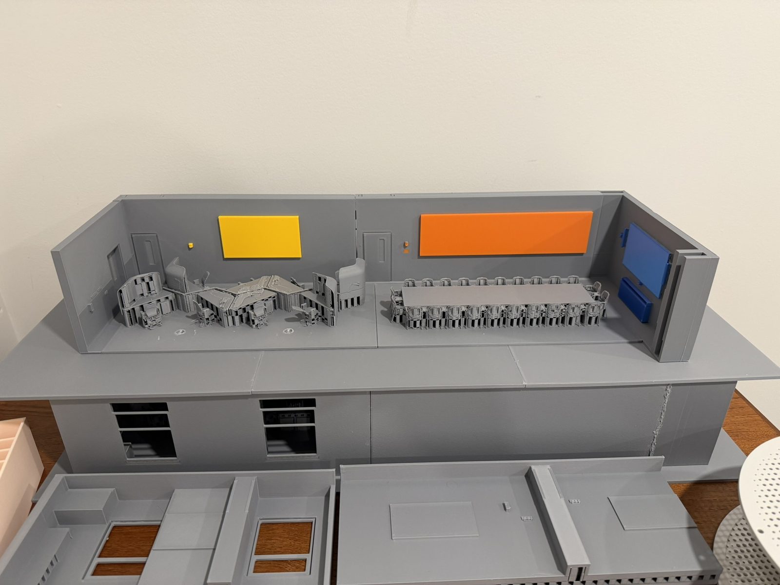 3D-printed model of a full command centre with coloured display walls
